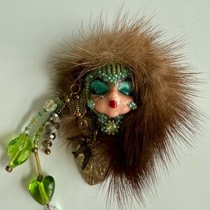 Vintage bejeweled Mardi Gras face Brooch